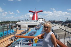 Julie on deck of the Carnival Splendor getting ready to set sail from Miami, Florida